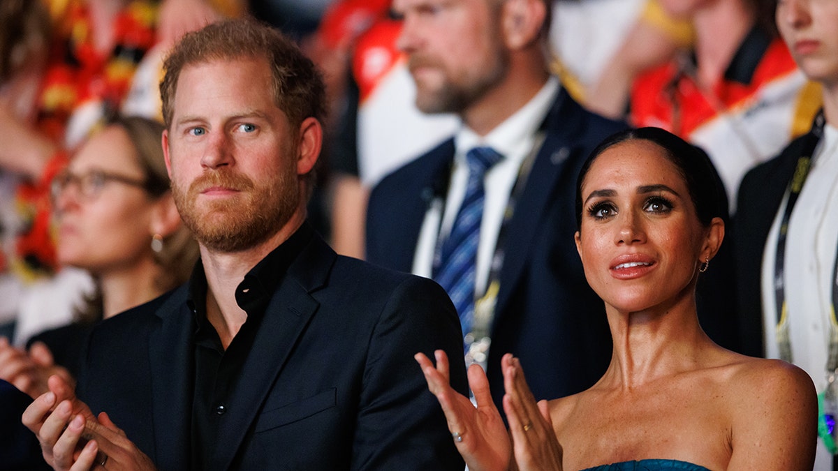 Harry and Meghan at an event