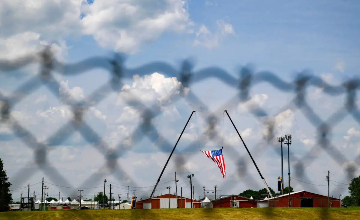 The American flag, which served as the backdrop for a campaign rally by former President and then-Republican candidate Donald J. Trump, blows in the wind at Butler Fairgrounds in the aftermath of the attempted assassination of the former president in Butler, Pa., on July 14, 2024. (Jeff Swensen/Getty Images)