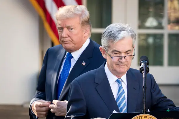 President Donald Trump looks on as his nominee for the chairman of the Federal Reserve, Jerome Powell, takes to the podium during a press event in the Rose Garden at the White House in Washington on Nov. 2, 2017. (Drew Angerer/Getty Images)