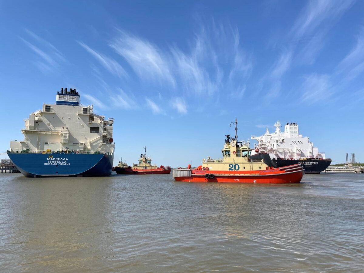 An LNG tanker is guided by tug boats at the Cheniere Sabine Pass LNG export unit in Cameron Parish, La., on April 14, 2022. (Marcy de Luna/Reuters)