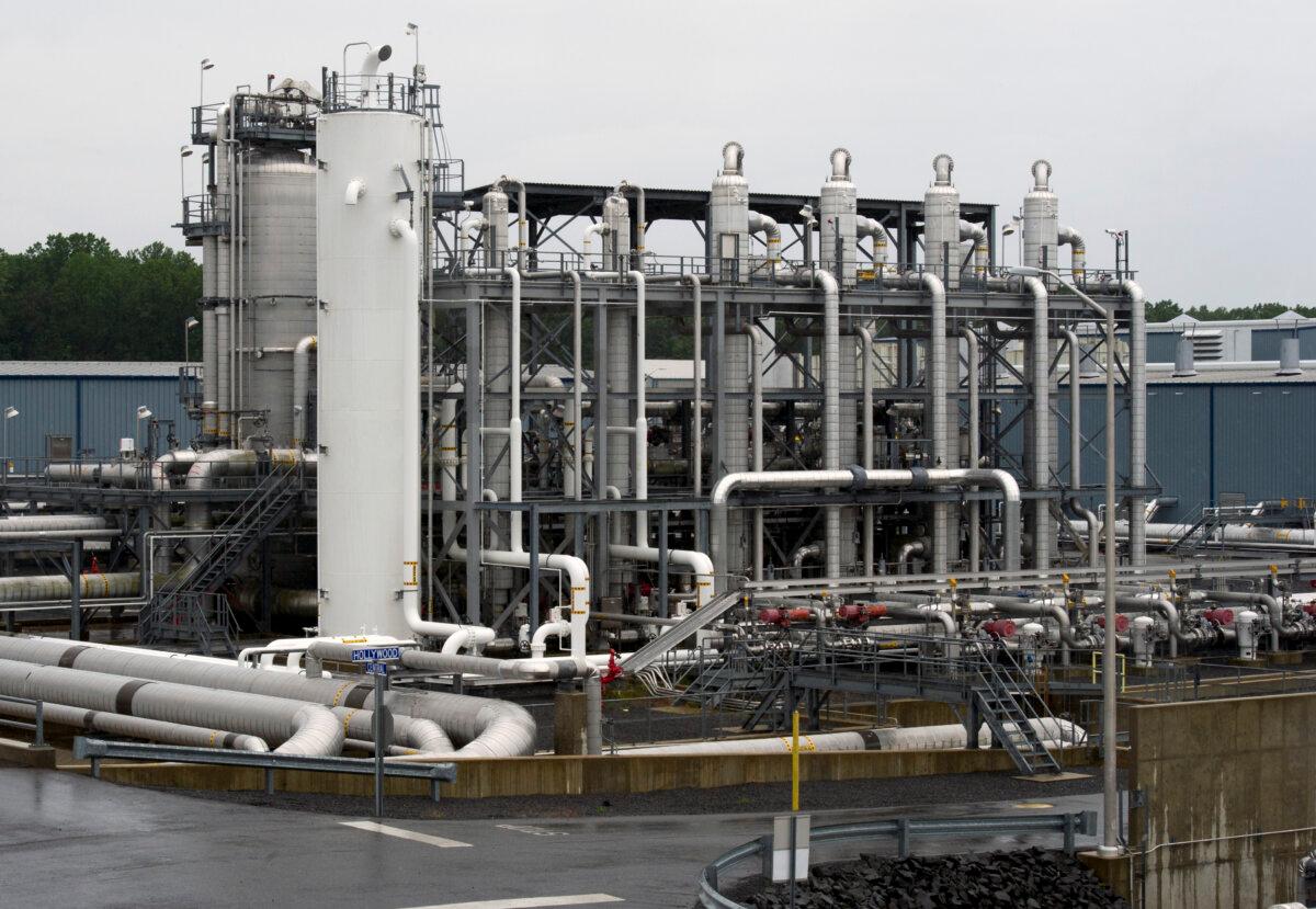 A heat exchanger and transfer pipes at Dominion Energy's Cove Point LNG Terminal in Lusby, Md., in this file image. (Cliff Owen/AP Photo)