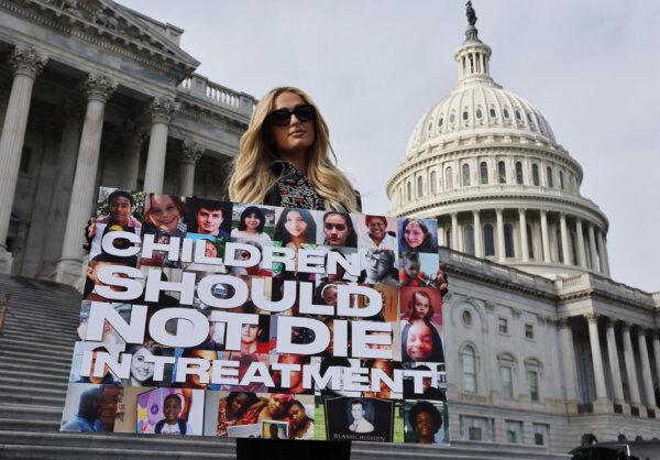 Celebrity hotel heiress Paris Hilton poses for photographs outside the U.S. Capitol to show her support for the Stop Institutional Child Abuse Act, on Dec. 17, 2024. (Chip Somodevilla/Getty Images)