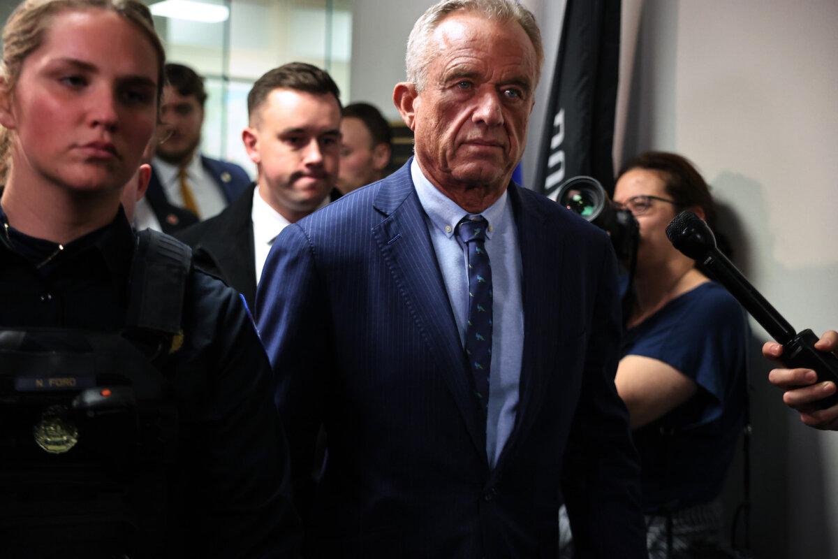 Robert F. Kennedy Jr., President-elect Donald Trump's nominee to be secretary of Heath and Human Services, arrives for a meeting with Sen. Markwayne Mullin (R-Okla.) in the Hart Senate Office Building on Capitol Hill in Washington on Dec. 16, 2024. (Chip Somodevilla/Getty Images)