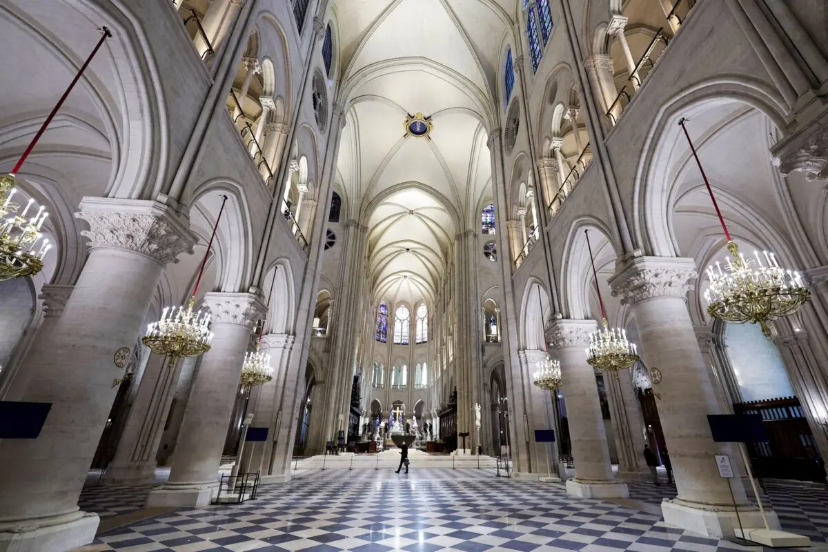 The nave of Notre-Dame de Paris cathedral is seen while French President Emmanuel Macron visits the restored interiors of the cathedral in Paris on Nov. 29, 2024. (Stephane de Sakutin, Pool via AP)