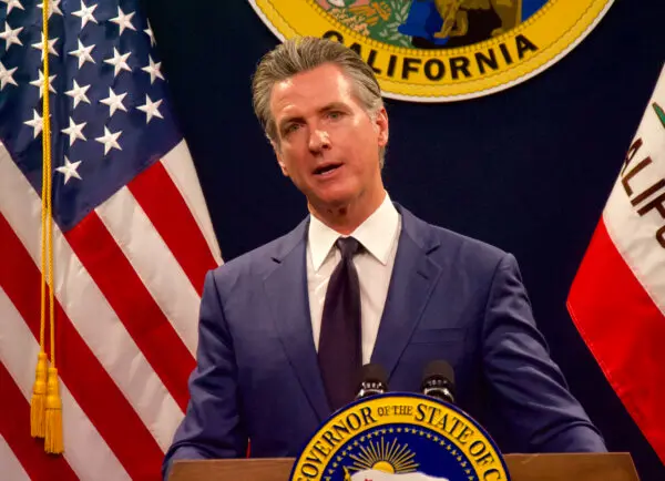 Gov. Gavin Newsom announces billions of dollars in spending cuts during his May budget revision press conference at the Capitol on May 10. (Travis Gillmore/The Epoch Times)