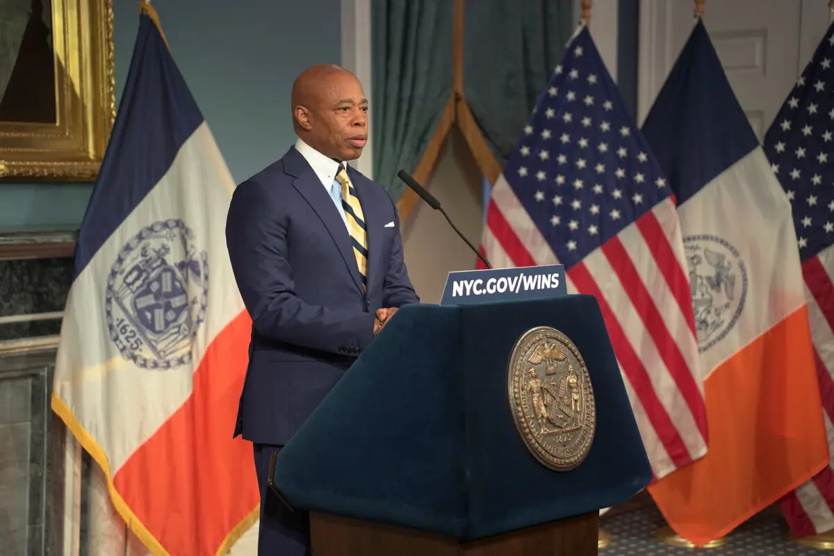 New York City Mayor Eric Adams speaks at a media availability event after meeting with border czar Tom Homan in New York City, on Dec. 12, 2024. (Oliver Mantyk/The Epoch Times)