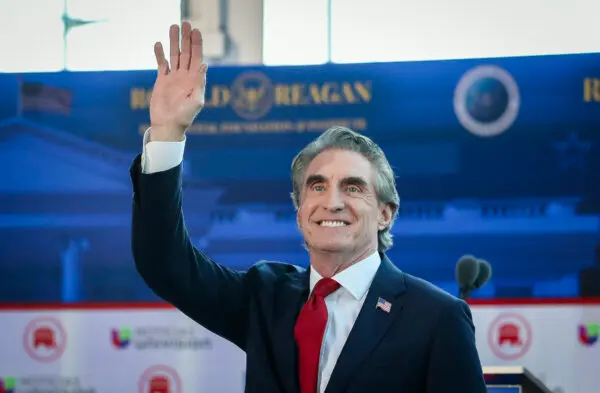 Then-presidential candidate Doug Burgum enters the debate area of the Ronald Reagan Presidential Library in Simi Valley, Calif., on Sept. 27, 2023. (John Fredricks/The Epoch Times)