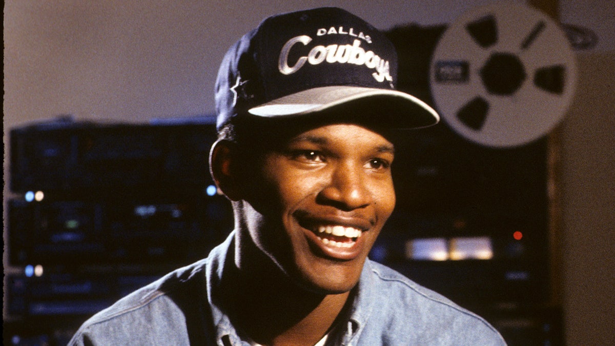 Jamie Foxx wears Dallas Cowboys hat and denim shirt during interview