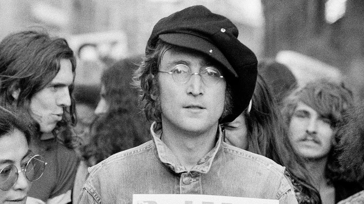 Black and white close up of John Lennon