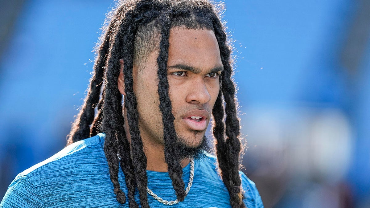 Jonathon Brooks looks on field during warmups