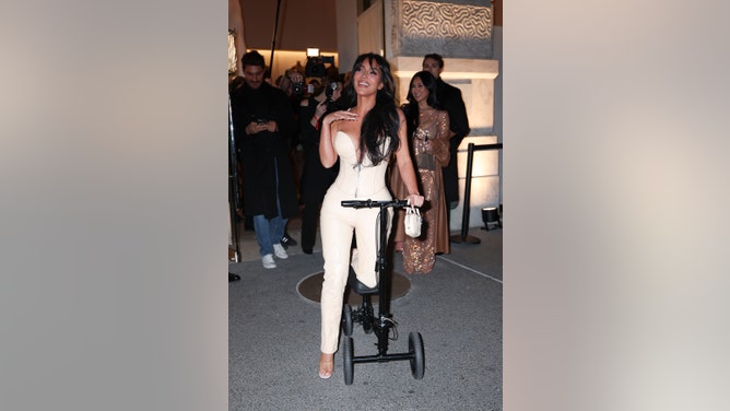 kim kardashian skims furkini broken foot