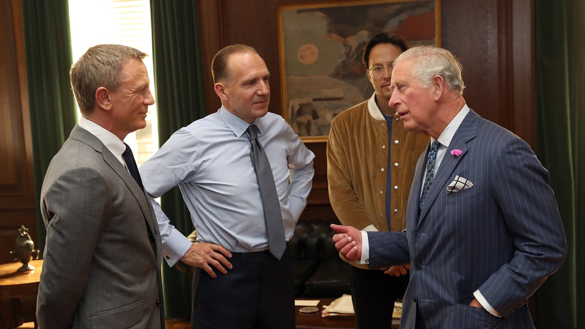 King Charles meets Daniel Craig and Ralph Fiennes on James Bond set