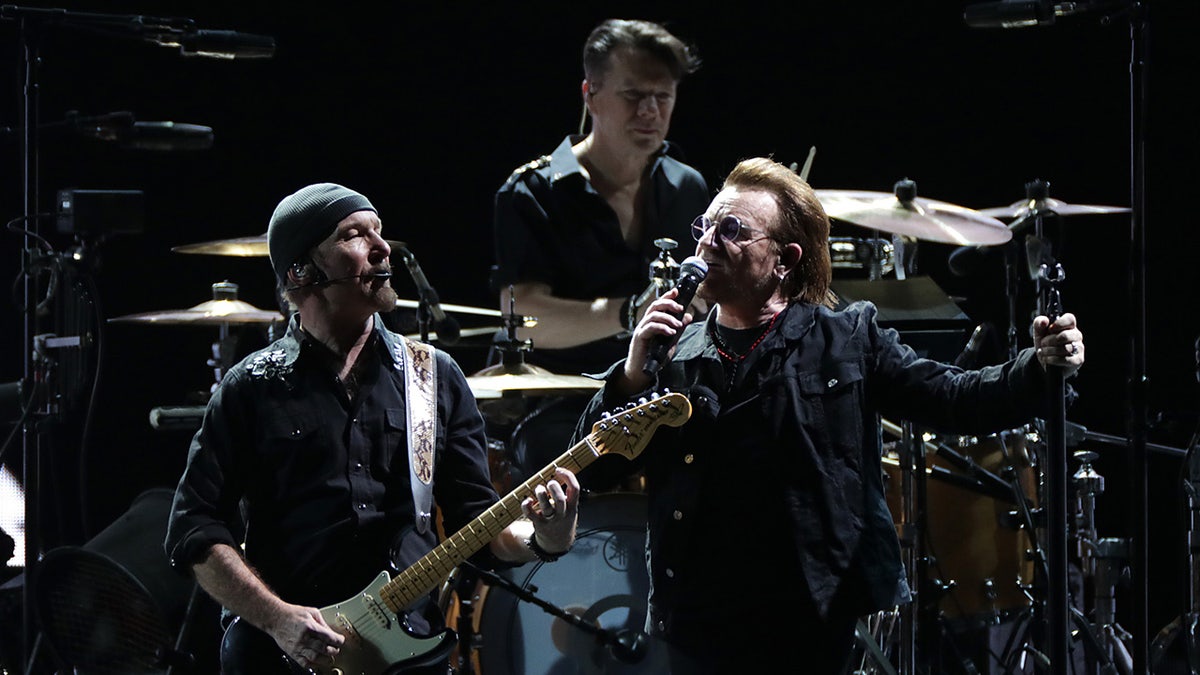 A photo of U2 in concert