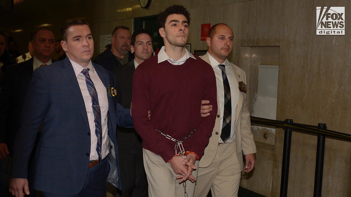 Luigi Mangione enters the courtroom in New York City Criminal Court