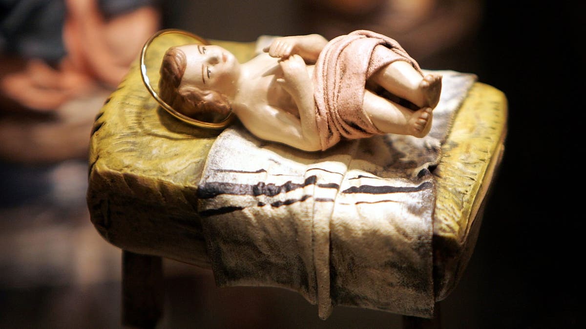 WASHINGTON - DECEMBER 9: A scuplture of a baby Jesus that is part of a nativity scene from Spain is displayed during a 