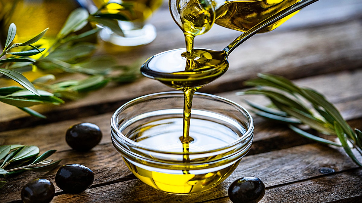 Pouring olive oil