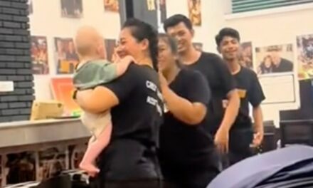 Restaurant staff watch baby so parents can eat meals in peace