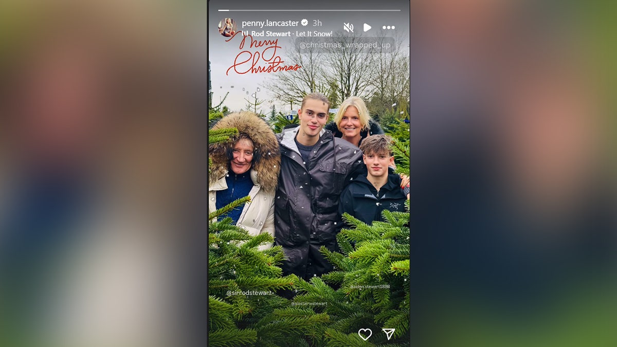 Stewart posed for a rare photo with his wife and their two sons, at a Christmas tree farm.