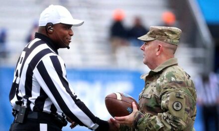 College football referee interrupts penalty call to salute military veterans during Celebration Bowl