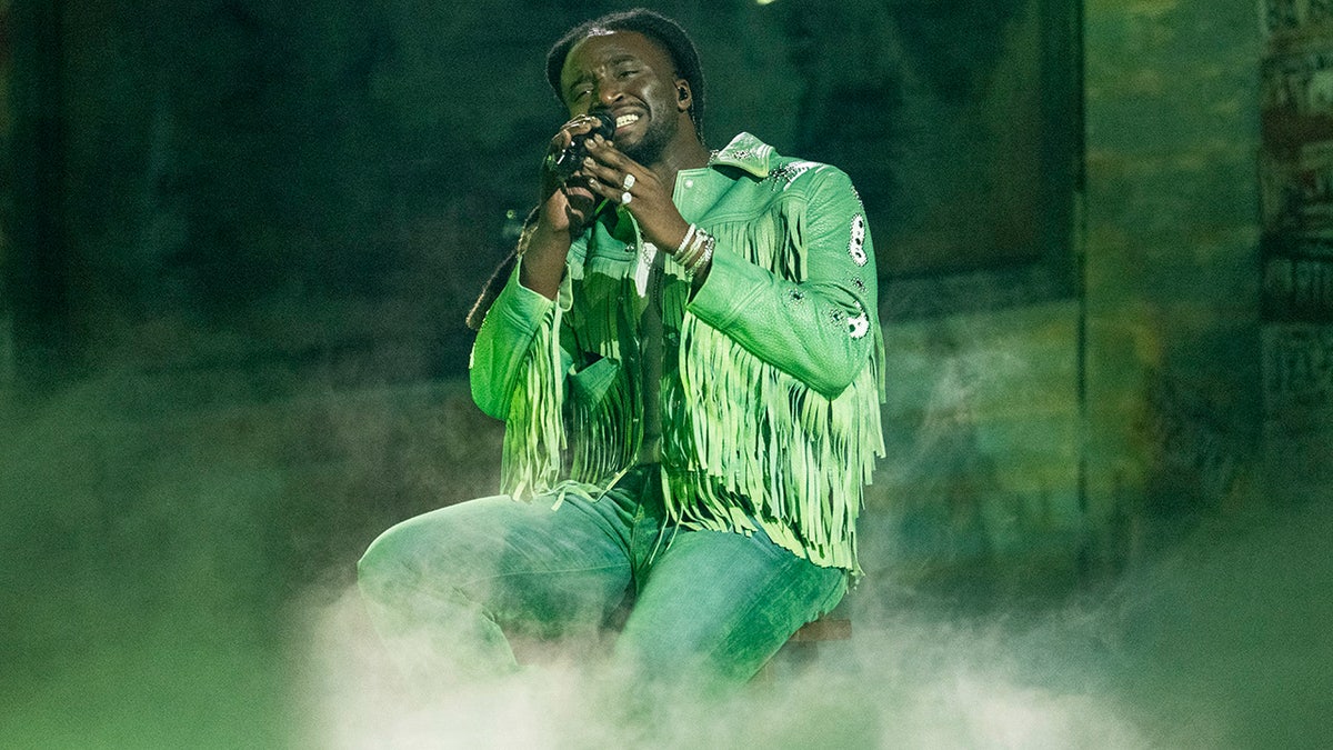 Shaboozey performing at the 2024 CMA Awards