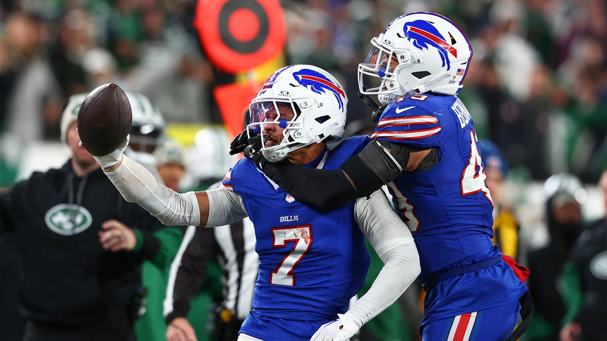 Taron Johnson celebrates