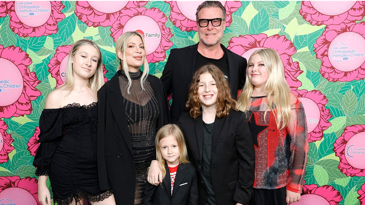 Tori Spelling and Dean McDermott with their kids.