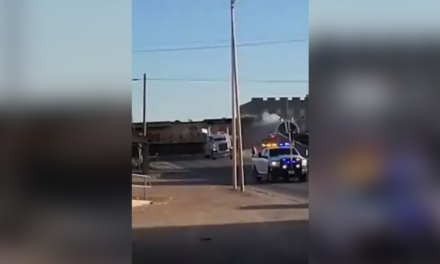 Texas train derails after hitting tractor-trailer, barrels into city building: video