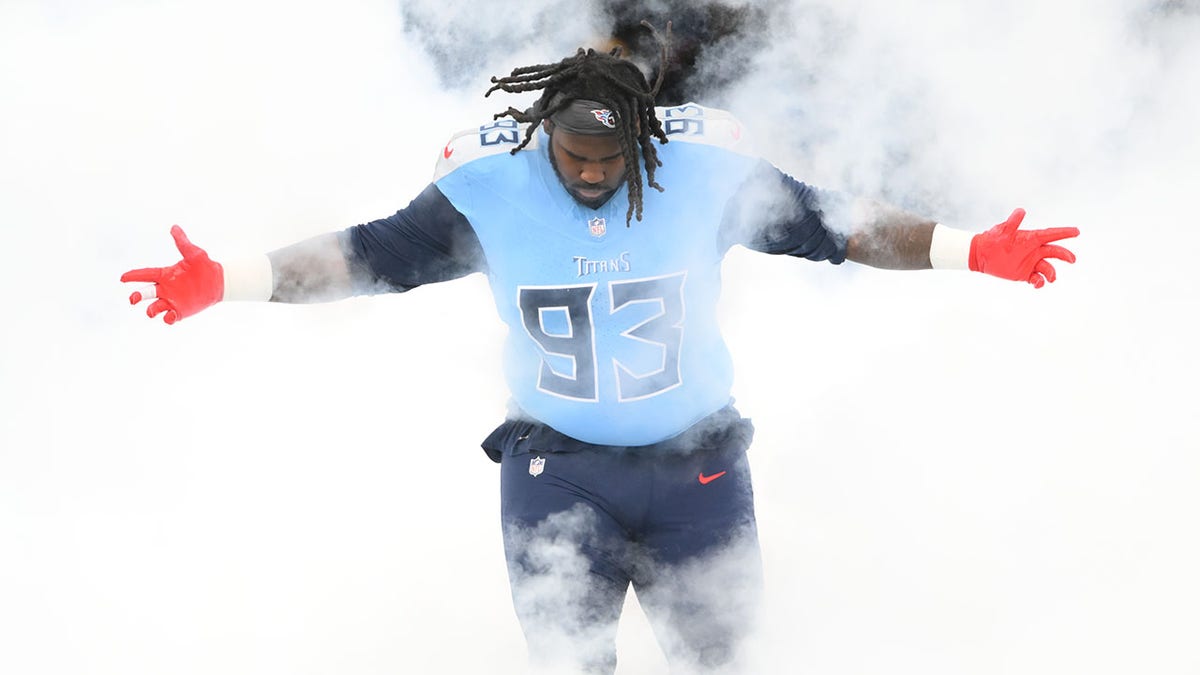 T'Vondre Sweat walks through the tunnel