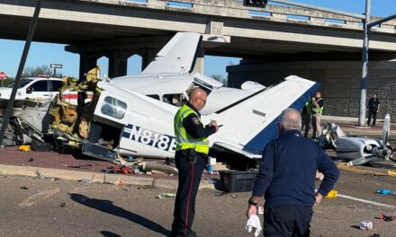 Aftermath of small plane crash onto Texas roadway caught on camera with split fuselage, damaged vehicles