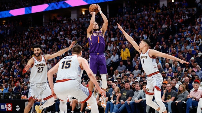 Phoenix Suns guard Devin Booker shoots a fadeaway over the Denver Nuggets during the 2023 NBA playoffs at Ball Arena. (Isaiah J. Downing-USA TODAY Sports)