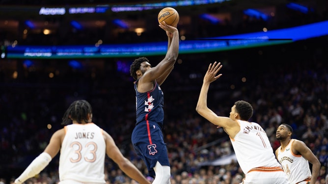 Philadelphia 76ers CJoel Embiid shoots a fadeaway over San Antonio Spurs C Victor Wembanyama at Wells Fargo Center. (Bill Streicher-Imagn Images)