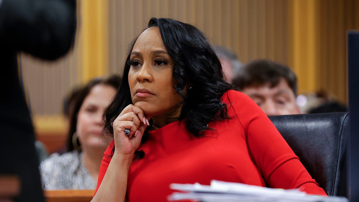 Fulton County District Attorney Fani Willis looks on during a hearing on the Georgia election interference case in March. Donald Trump and others were indicted on sweeping racketeering charges in Georgia, to which Trump pleaded not guilty. (Alex Slitz/USA Today)