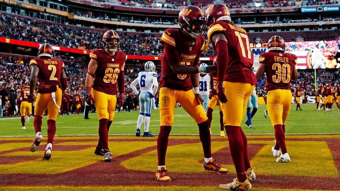 Washington Commanders WR Terry McLaurin celebrates a touchdown QB Jayden Daniels against the Dallas Cowboys at Northwest Stadium. (Peter Casey-Imagn Images)