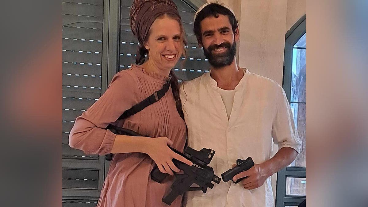 Midwife and her husband with guns