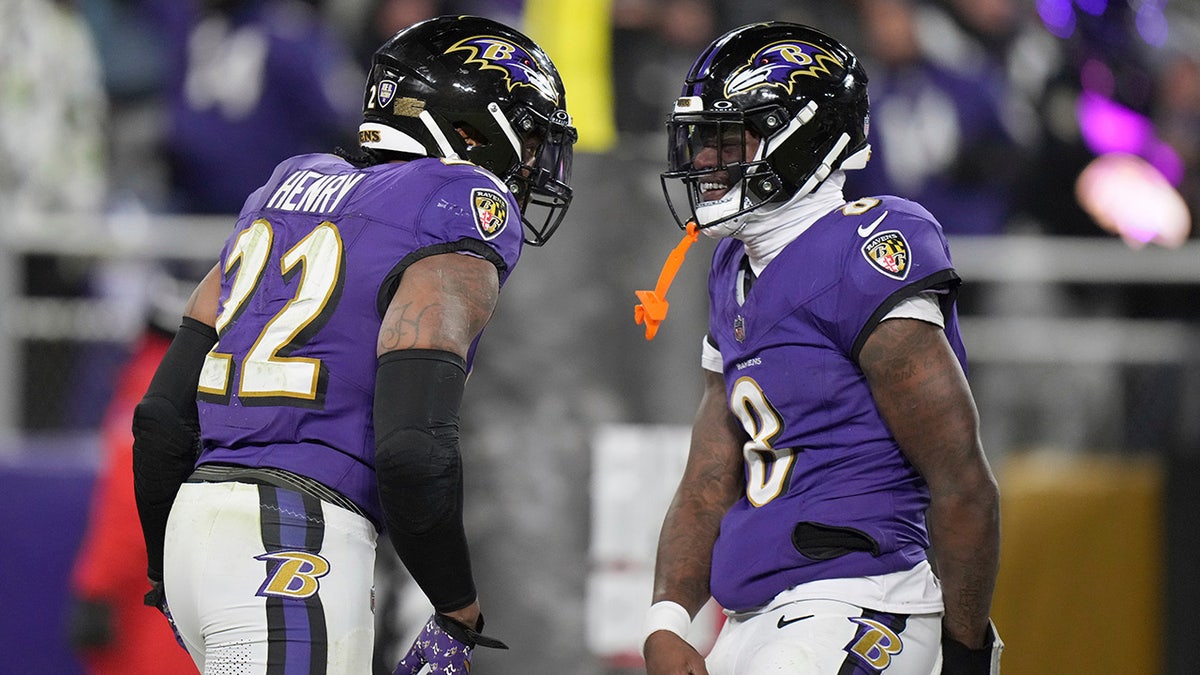 Derrick Henry and Lamar Jackson celebrate