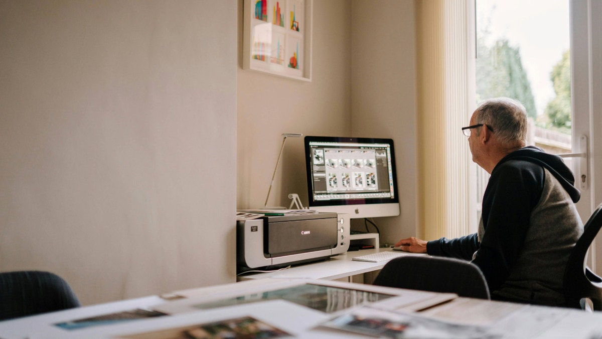 Man transferring photos