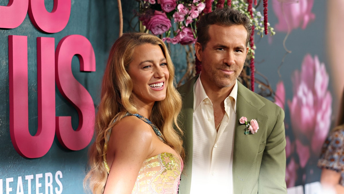 Blake Lively and Ryan Reynolds take a photo together