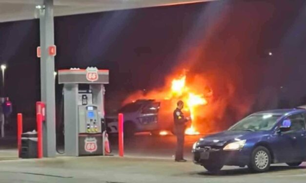 Maybe a gas station wasn’t the best place to be when this cop car mysteriously burst into flames…