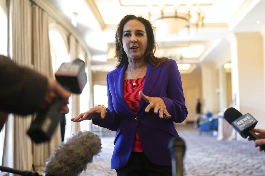 Harmeet Dhillon talks to reporters at the Republican National Committee winter meeting in Dana Point, Calif., Friday, Jan. 27, 2023. (AP Photo/Jae C. Hong)