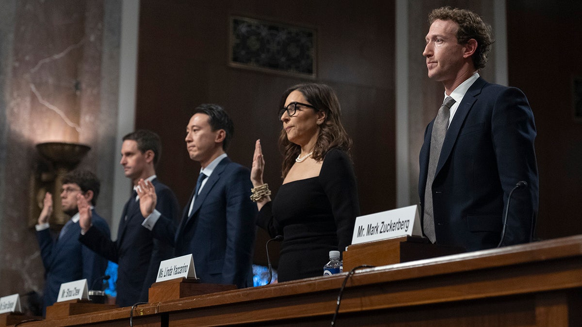 Big Tech CEOs swearing in at Senate hearing, Zuckerberg far right