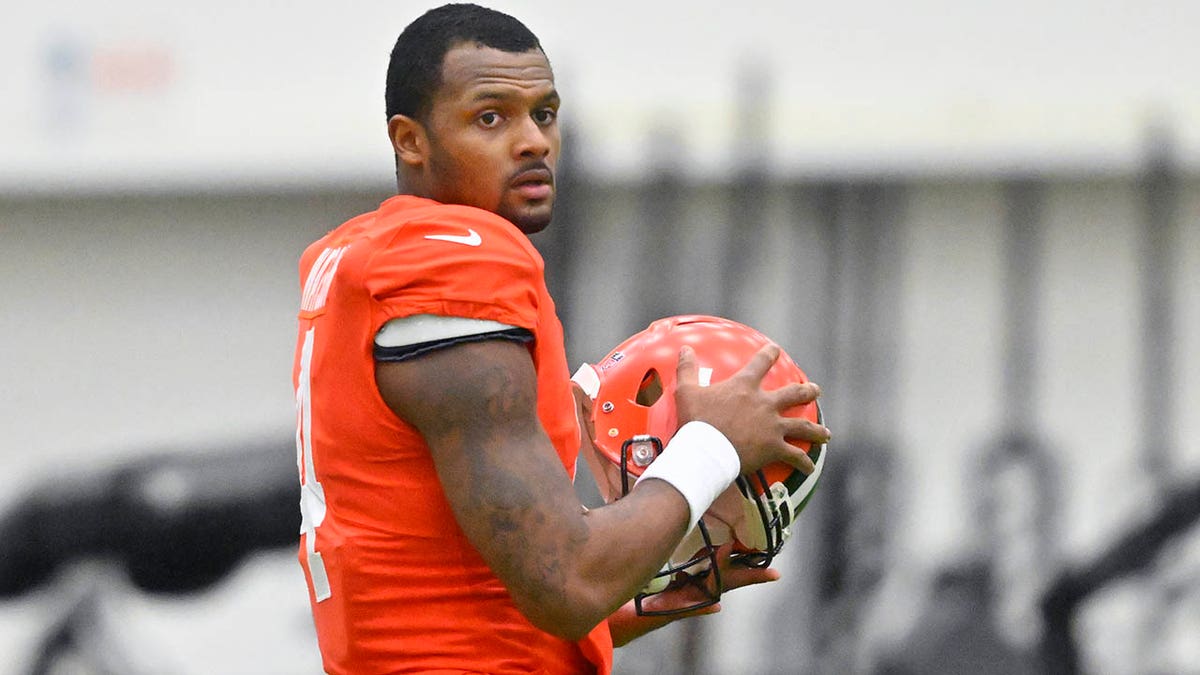 Deshaun Watson looks to the side