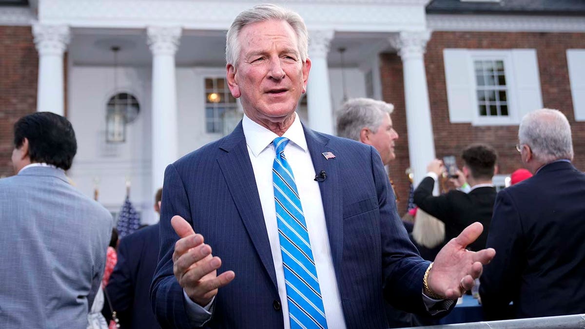 Tommy Tuberville talks during a television interview before former President Donald Trump speaks at Trump National Golf Club in Bedminster