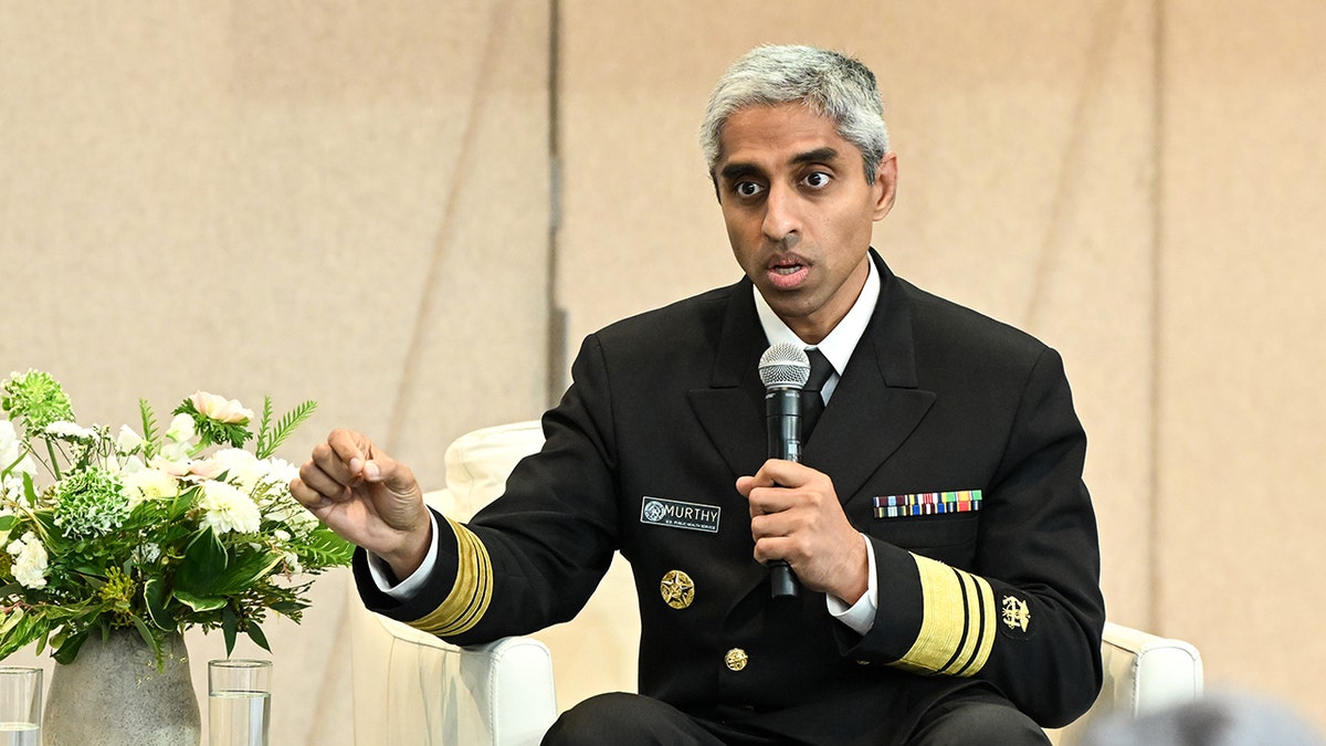 Vivek Murthy, US surgeon general speaking into mic