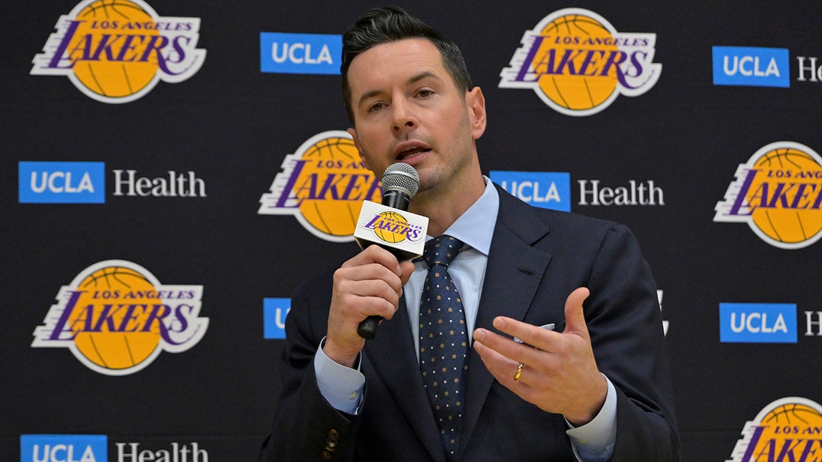 JJ Redick speaks on microphone