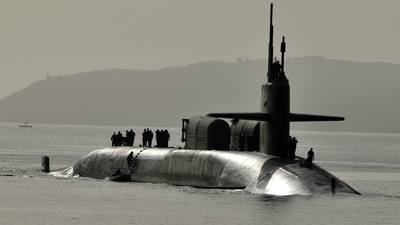 SOUDA BAY, Greece (May 21, 2013) The Ohio-class guided-missile submarine USS Florida (SSGN 728), gold crew, arrives in Souda harbor. Florida is homeported in Kings Bay, Ga., and is deployed conducting maritime security operations and theater security cooperation efforts in the U.S. 6th Fleet area of responsibility. (U.S. Navy photo by Paul Farley/Released) 130521-N-MO201-047