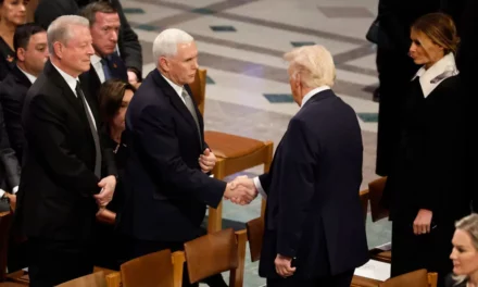 Trump Shakes Hands With Pence, Talks With Obama At Carter Funeral