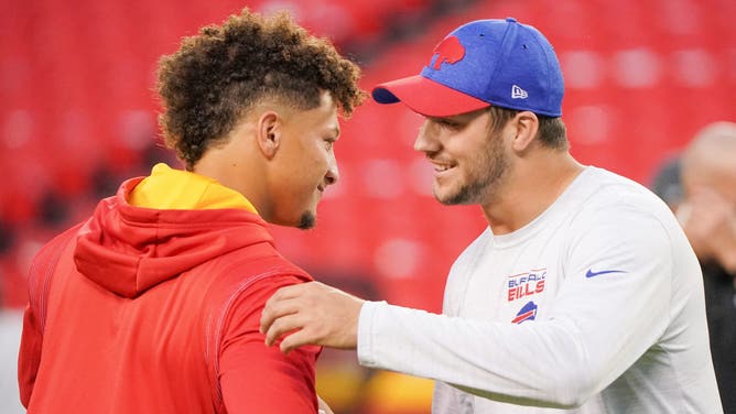 Kansas City Chiefs quarterback Patrick Mahomes talks with Buffalo Bills quarterback Josh Allen before warm-ups at GEHA Field at Arrowhead Stadium. 