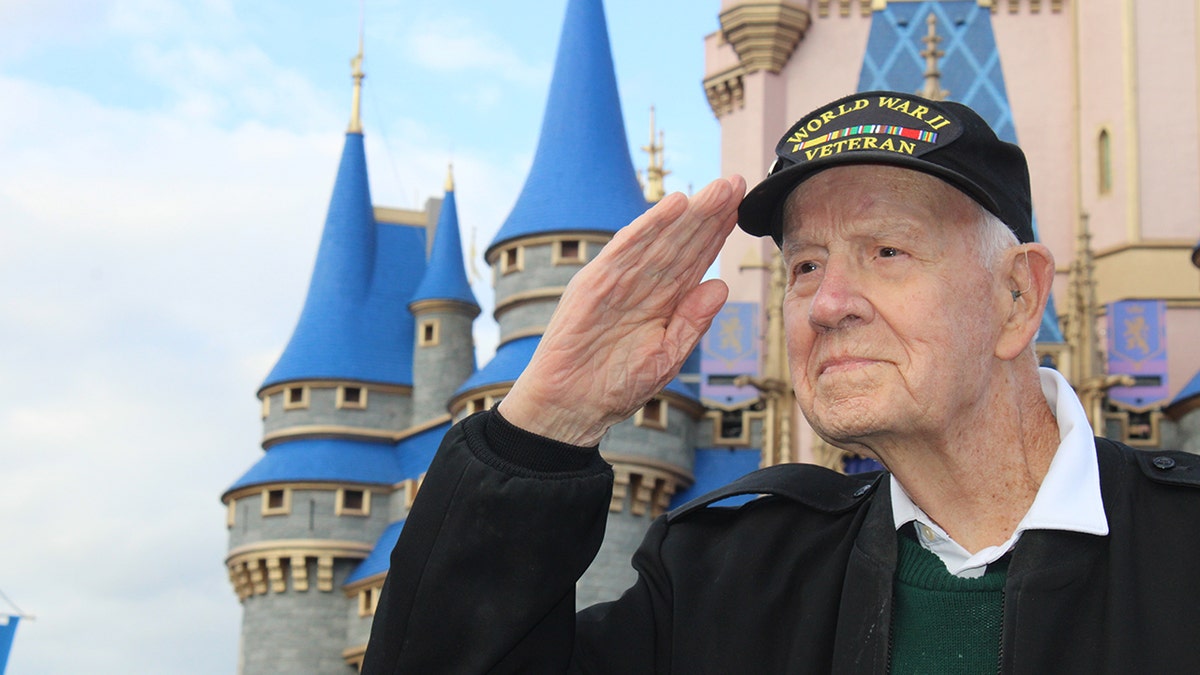 Bill Connelly in front of Magic Kingdom castle