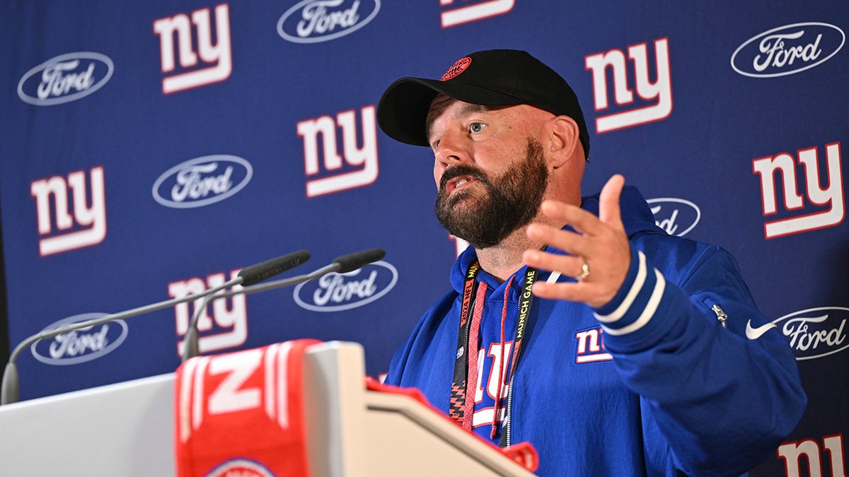 Brian Daboll speaks at lectern