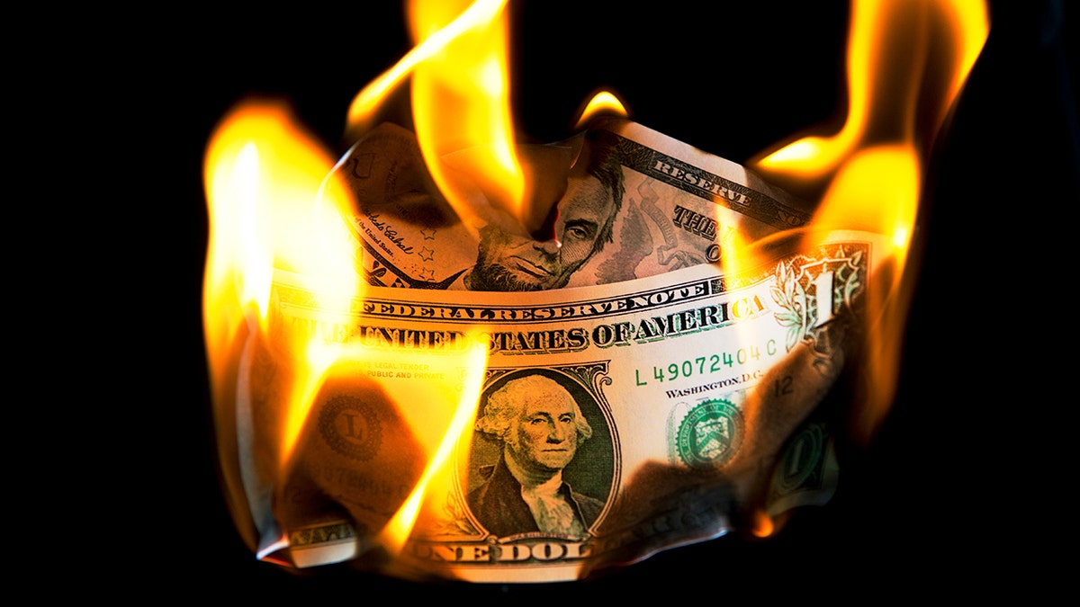 Burning money